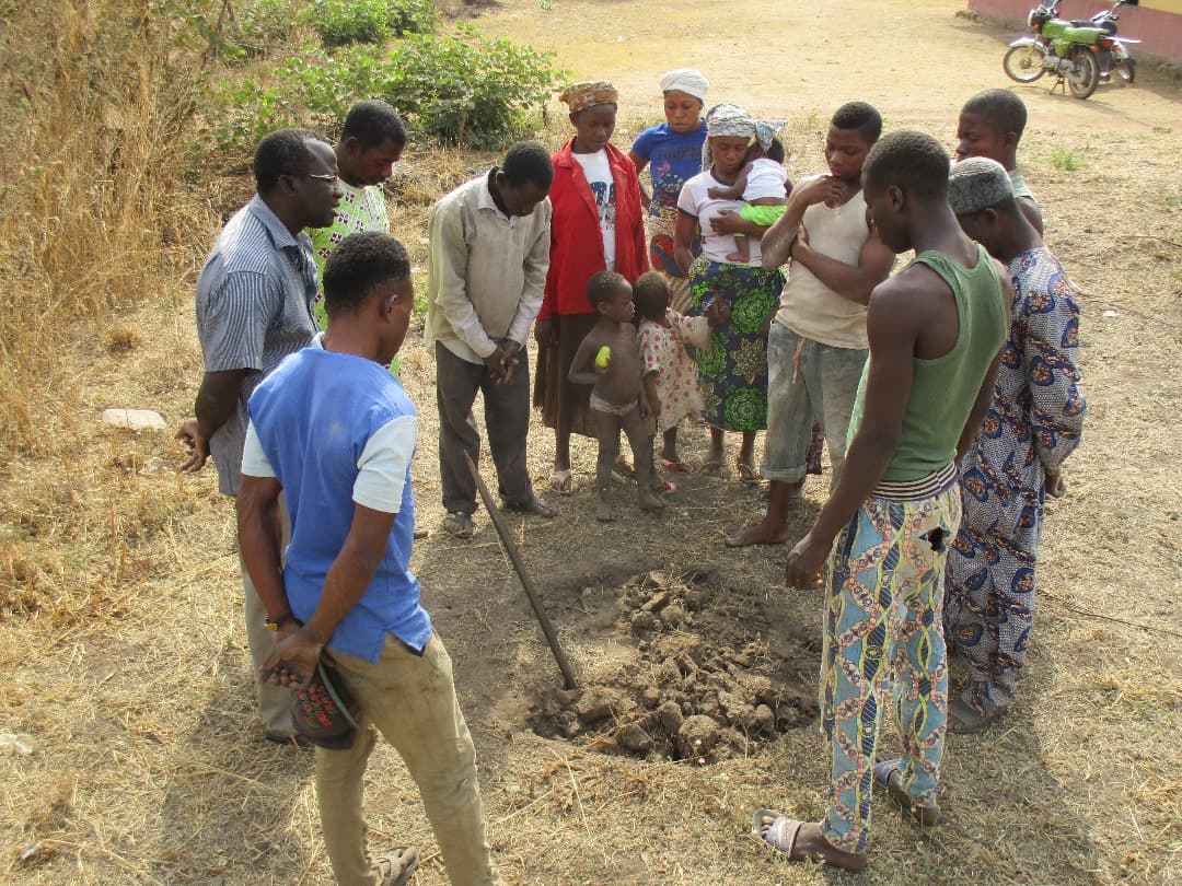 Farmers receiving hands-on agricultural training
