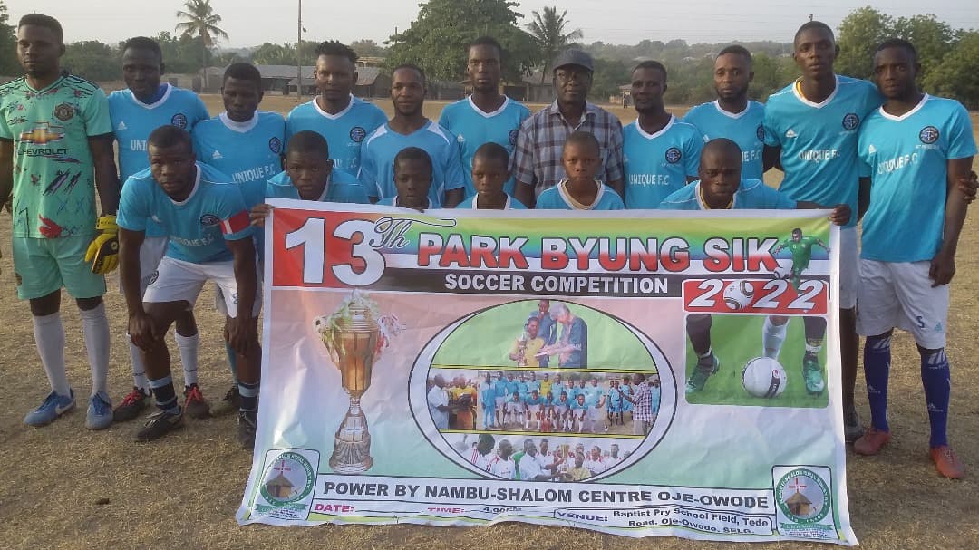 Youth playing football at Nambu-Shalom sports outreach event